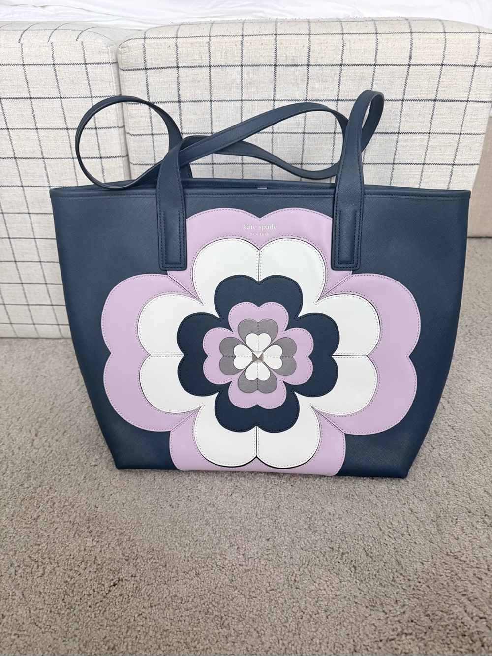 kate spade navy tote with pink and white floral applique